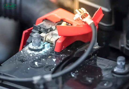 what is the white stuff on battery terminals